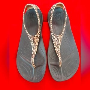 Crocs Sexi Leopard print T Strap Flip Flop, size 7 W